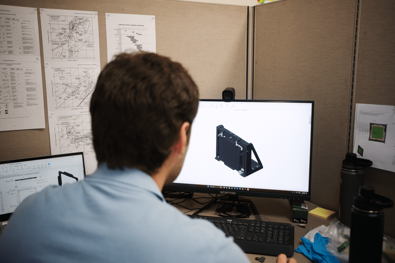 A mechanical engineer works on a CAD model of a FP9 stage