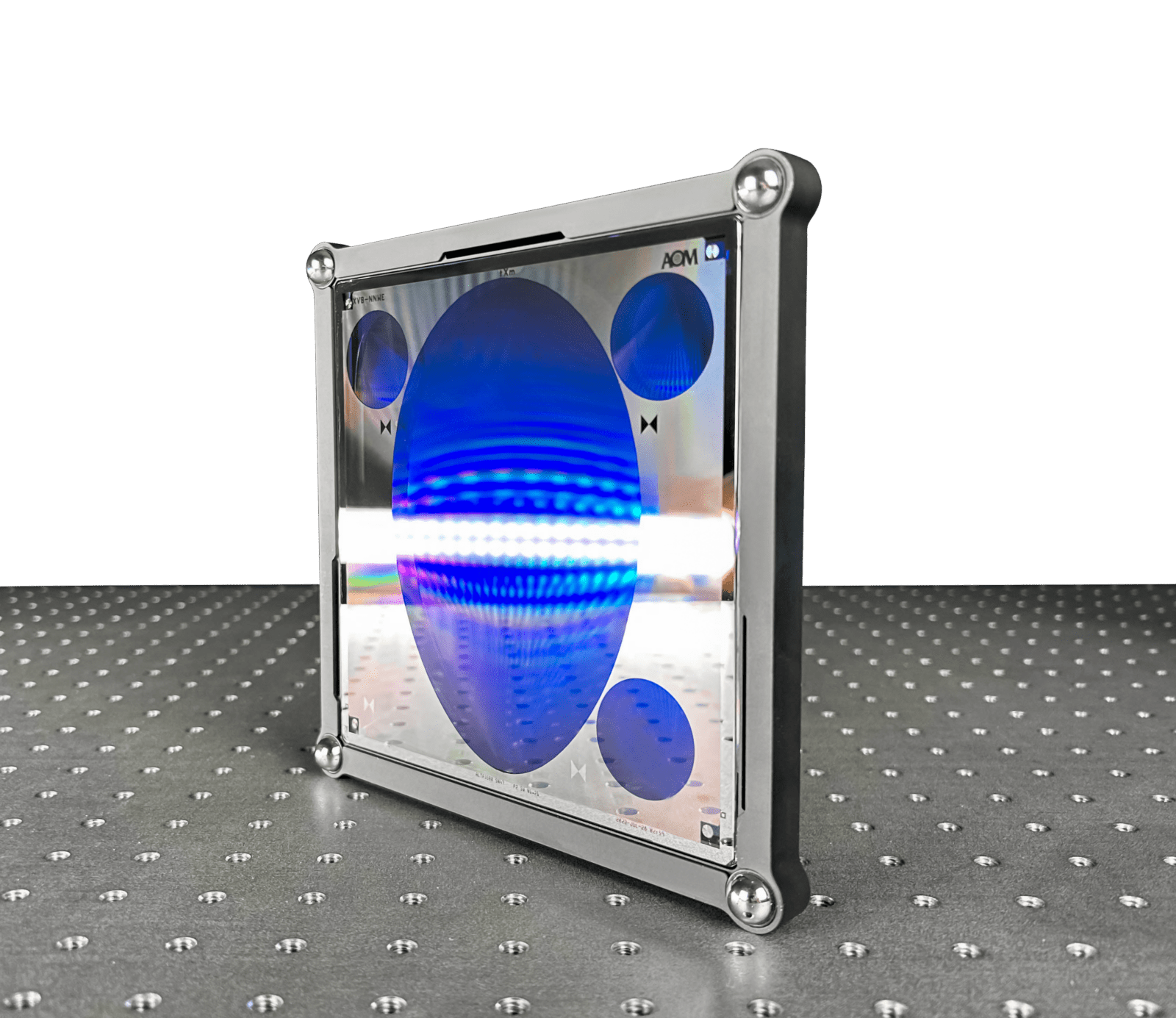 CGH With Alignment An AOM computer-generated hologram (CGH) with alignment patterns sits upright on an air table