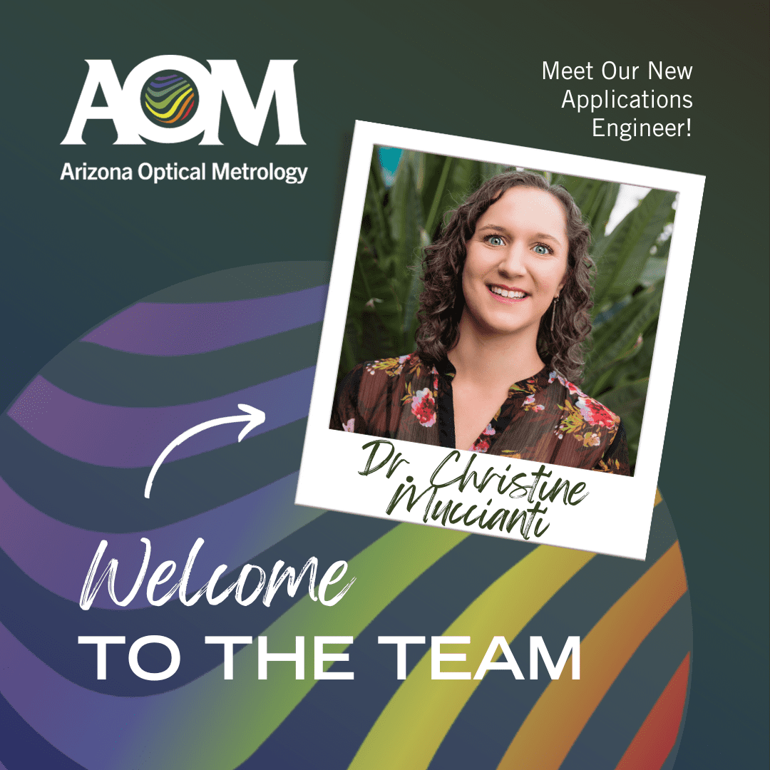 Meet Christine AOM’s New Applications Engineer A polaroid style photo of Dr. Christine Muccianti is in front of the AOM rainbow fringe logo with the text Welcome To The Team.